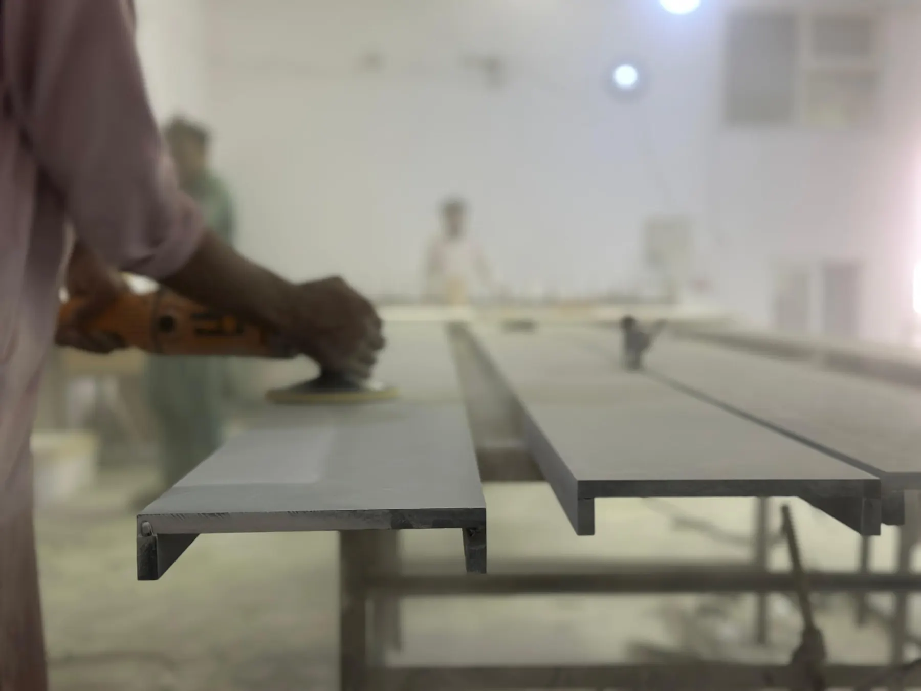 Sanding a solid-surface panel edge to a seamless finish